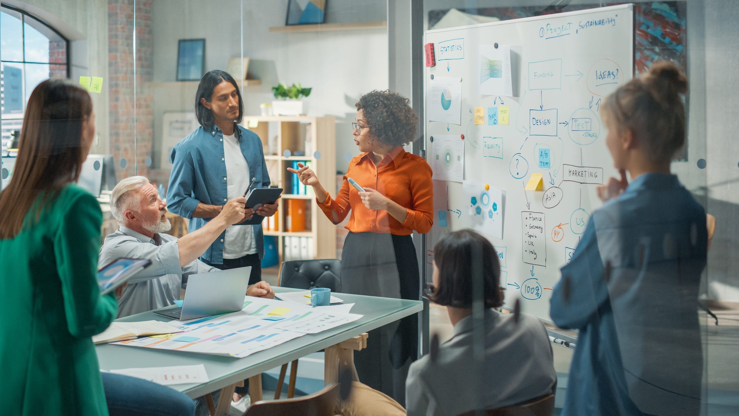 Group of leaders in discussion in a conference room